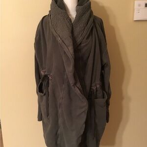 Free People sweatshirt jacket with hood.